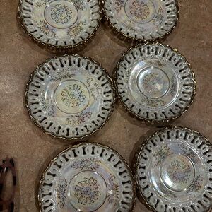 Elegant Gold and Cream Decorative Plates